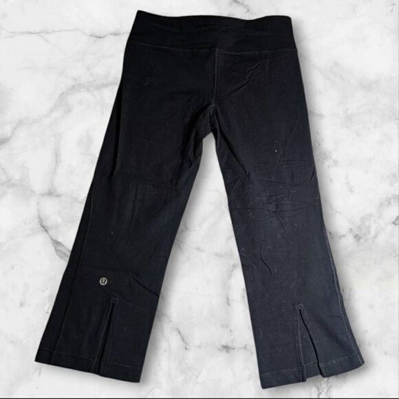 Lululemon Size 4 Black Flare Slit Leggings - Picture 3 of 3